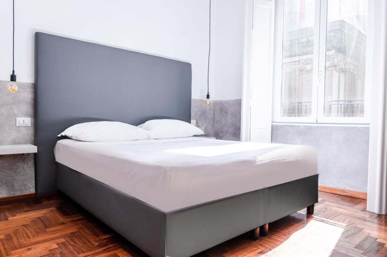 Toledostop Naples Exterior photo A double bed